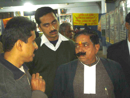HJS member explaining lawyers about the charts in the exhibition
