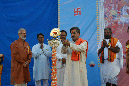 Inaguration of Dharmasabha: Pujya Charudatta Afhale lighting the Deep