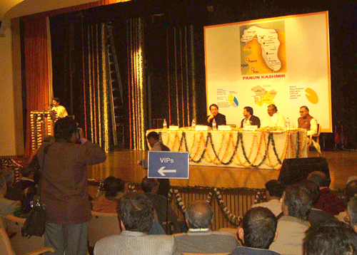 Dignitaries on the stage and Dr. Marathe, HJS addressing the public