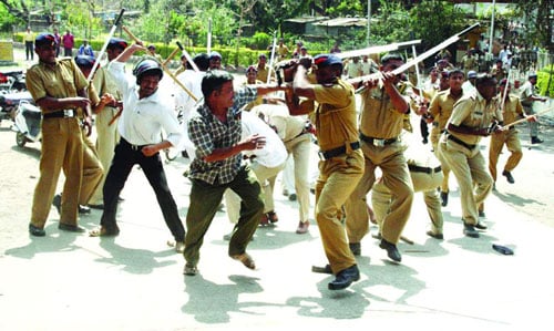 A tussle between Police and public.