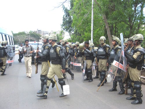Armed action force jawans on street for intimidating the agitation
