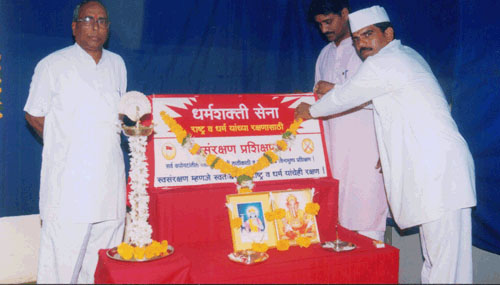H.B.P. Narayan Maharaj Pawar putting garland