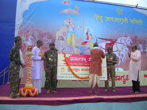 Inauguration of Dharma Shakti Sena by putting garland