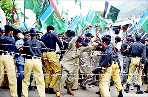 Kashmiri Muslims with Pakistani Flags near Line of Control