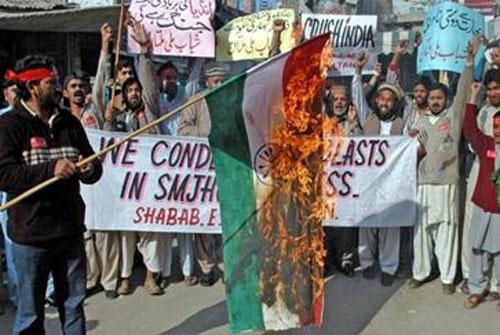 Indian National Flag burn by anti-Indians -  2