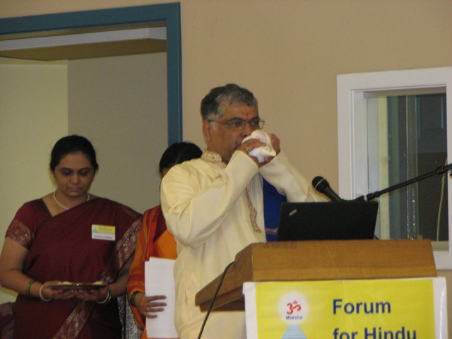 Conch blowing by Dr. M.G. Prasad at beginning of Dharmasabha