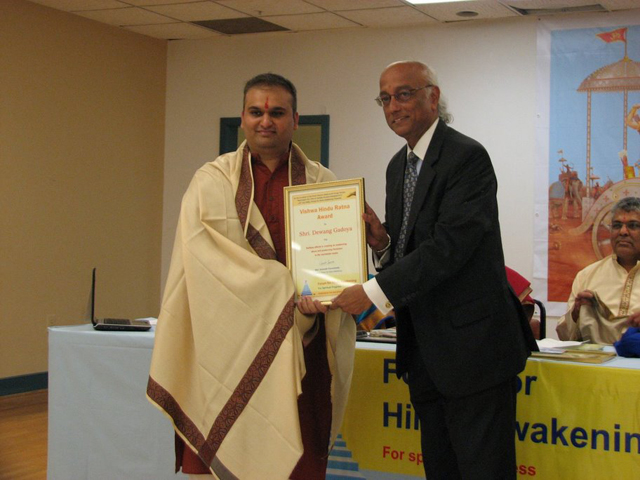 Honouring of Shri. Dewang Gadoya of HJS