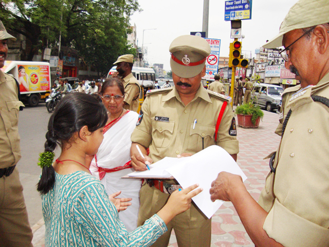 Police officers signing on memorandum against NCERT's controversial History Textbooks