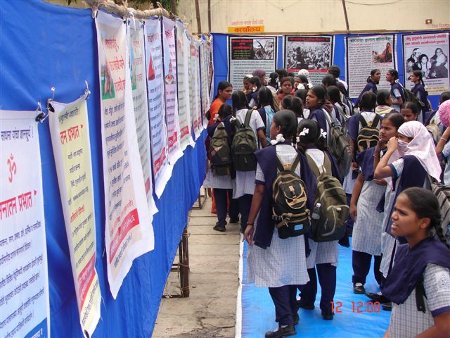 School going students viewing FACT exhibition on Terrorism
