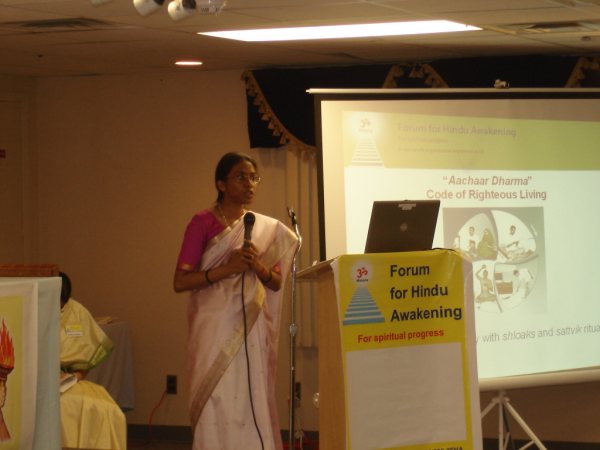 Bhavna Shinde of FHA giving speech in Dharmasabha