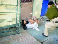 Police beating sadhu