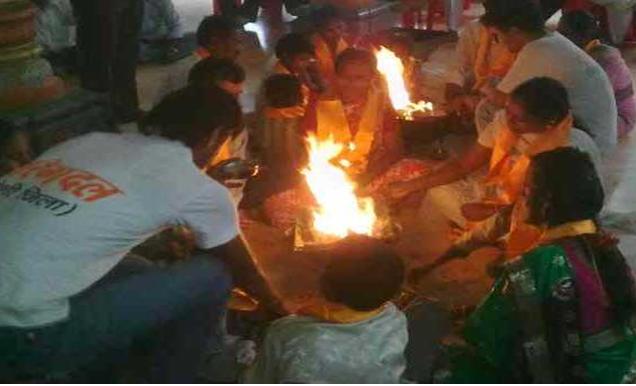 Families performing reconversion yagna Families performing reconversion yagna