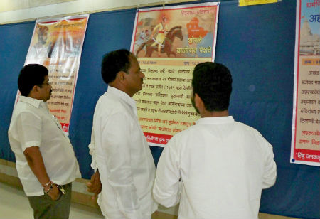Mr. Chaudhary, Shivsena (Center) looking at exhibition