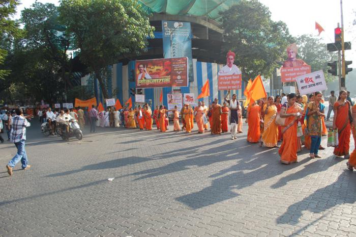 Saffron clad Hindu women participating in the rally