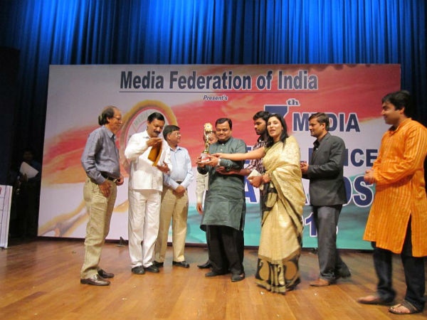 Shri. Suresh Chavhanake od 'Sudarshan TV' receiving award