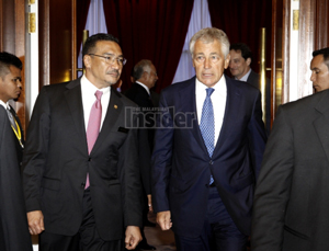 Hishammuddin escorting Hagel to their meeting today. The Malaysian Insider pic by Nazir Sufari, 