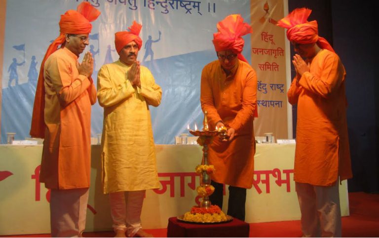 from left – Shri. Manoj Khadye, Shri. Shivaprasad Joshi, Shri. Rahul Razdan (lighting lamp) and Shri. Chetan Rajhans