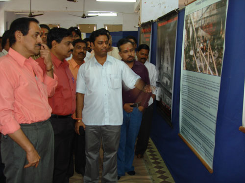 HJS spokesperson explaining exhibition to dignitaries