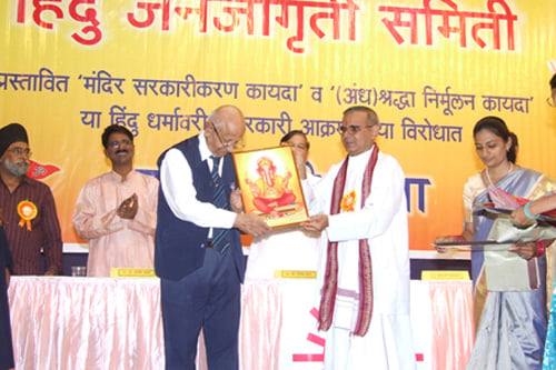 Revered Shri. Sunil Chincholkar felicitating Prof. G.C. Asnani