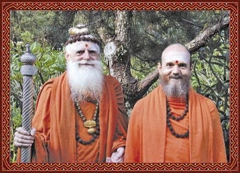 From Left Late Satguru Sivaya Subramuniyaswami & his </br> successor Satguru Bodhinatha Veylanswami” title=”From Left Late Satguru Sivaya Subramuniyaswami & his </br> successor Satguru Bodhinatha Veylanswami” /><br />
<br />From Left Late Satguru Sivaya Subramuniyaswami & his </br> successor Satguru Bodhinatha Veylanswami
</div>
<p> Wailua, Hawaii:  </strong>In a clearing within Kauai Aadheenam’s lush gardens, the ping, ping, pinging of metal chipping at stone can be heard as a half-dozen artisans from India put the finishing flourishes on the Hindu monastery’s legacy for the ages.</p>
<p>Hand-carved in granite and shipped in pieces to the island from India, the Iraivan Temple is faithful to the precise design formulas defined by South Indian temple builders a thousand years ago. The $8 million temple to the god Shiva is the first all-stone Hindu temple outside of India, according to the Kauai monks. The project is a rarity even in India.</p>
<p>The ranks of skilled carvers from India have dwindled in recent centuries, as stone has yielded to concrete and steel. Design modifications in new temples outside India have become a necessity to make worship at the traditionally open-air spaces bearable during the winters in Canada or New York City.</p>
<p>Lush, tropical Kauai, known as Hawaii’s Garden Isle, doesn’t have that problem. "Actually it’s the first all-stone temple made anywhere in quite a while. I think our architect in India said he’s made two in 50 years," said Sannyasin Arumugaswami, a generously bearded monk enveloped in an orange cotton robe.</p>
<p>Construction began in 1990 and could take another 10 years to finish because of the mass of the structure and the skill needed to build it. The temple has already incorporated 80 shipping containers worth of stone and is surmounted by a gold-gilt cupola carved over three years by just four men. The temple is the vision of a former ballet dancer and Californian who founded the monastery back in 1970, Satguru Sivaya Subramuniyaswami.</p>
<p>Subramuniyaswami, who died at 74 in 2001, embraced Hindu monasticism in the late 1940s. Today his Kauai monastery is home to 22 monks who spend their days in prayer at the monastery’s current Kadavul Temple, tending the monastery’s fruit orchards and livestock, or putting out the order’s quarterly publication "Hinduism Today." </p>
<p>While many of the Kauai monks are converts, hailing from about six different countries, the order’s focus, as reflected in its stone temple, is on tradition. And the rules here are strict. While day-trippers are welcome, the monastery does not allow the curious to try out monastic life for a few days or weeks. The minimum stay is six months. And all the monks are celibate, single and male. Once they take their permanent vows, they do not speak of their lives before the monastery.</p>
<p>"It’s like the institution was picked up in India and plopped down here … Something our founder purposely tried to do is not dilute it or change it seriously because of where it is," said Satguru Bodhinatha Veylanswami, the current guru and abbot of the monastery. Still, the ascetics’ traditional orange, yellow or white cotton robes and shaved or bearded appearances belie their modern savvy. These monks have cell phones, digital cameras, podcasts and wide screen computer monitors to put out their magazine, with a worldwide circulation of 15,000 print and 5,000 digital. The monastery’s Web site gets up to 40,000 hits a day.<br />    <br />"If you start searching Hinduism on the Web you come to us in a hurry," said Arumugaswami, who is also managing editor of the magazine. The monks do not entirely eschew outside society. They have been deeply involved in community actions, which include helping design and print anti-drug bumper stickers they then donated to Kauai county, said state Sen. Gary Hooser, who lives near the monastery.</p>
<p>"They’re very good neighbors. … They have a significant presence in terms of building their temple and the monks and the property they have there. But they manage that presence very well, so it’s very low key," Hooser said.</p>
<p>The monastery’s partially constructed temple now stands at the edge of small valley that plunges down to the Wailua River, a pond and a few rushing waterfalls, and against a distant backdrop of soaring green mountains. Complete with tropical flowers and other plants _ some purchased from the National Tropical Botanical Garden headquartered on Kauai _ the monastery’s landscaped gardens are awe-inspiring.</p>
<p>"Part of the object is to place the temple in just the most beautiful Hawaiian environment possible," said Arumugaswami, explaining that the temple’s surroundings are a "natural" temple. Among the primary tenets of the order _ which has about 8,000 temple supporters and several hundred close disciples _ is the belief that Shiva is in everything and everyone. The goal is to understand one’s oneness with Shiva, and therefore be freed from the eternal cycle of death and rebirth into the physical world.</p>
<p>Subramuniyaswami left specific instructions for the new temple’s construction. No machinery may be used to cut the stone, which he believed would destroy the stone’s "song." Machines are only used to lift some of the larger stones into place. The guru also required that the temple be built without debt, prompting a fund raising campaign that has so far raised $10 million toward its goal of $16 million, half of which would be set aside as a maintenance endowment. The building still awaits part of its roof and its lava rock base that will be an homage to the design of sacred Hawaiian heiaus, ancient stone platforms used for worship in the islands. And the 700-pound crystal lingam _ a symbol of the god Shiva _ now housed in the monastery’s Kadavul Temple has yet to be installed in the new temple’s inner sanctum.</p>
<p>But the building began to spiritually "wake up" during a ceremony held last year. "The way that we look at a temple in Hinduism is that the temple itself is a form of God. And so it is divine. It’s not just a building. That’s why we go through so much trouble to build it," Arumugaswami said.</p>
<p><strong>Ref:</strong><br />http://www.washingtonpost.com/wp-dyn/content/article/2007/06/29/AR2007062900244.html<br />            <br /><strong>Related HJS Section<br /></strong>» <a href=