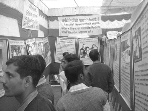 Hindus viewing photos on terrorism in Kashmir in FACT exhibition -  2