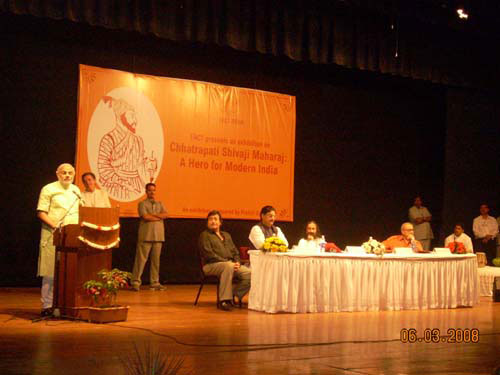 Shri. Narendra Modi giving speech on dias Shri. Narendra Modi giving speech on dias