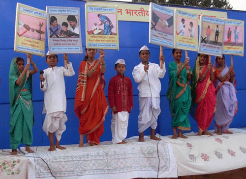 The attraction of Sabha -  Baalsadhaks demonstrating significance of <i> The Great Indian Culture<i>” title=”The attraction of Sabha –  Baalsadhaks demonstrating significance of <i> The Great Indian Culture<i>” /><br />
<br />The attraction of Sabha –  Baalsadhaks demonstrating significance of <i> The Great Indian Culture<i>
</div>
</td>
</tr>
</tbody>
</table>
</div>
<p><strong>Felicitation of celebrities:</strong></p>
<ol>
<li>Shri. Eknath (Bhai) Jagushtye was felicitated by Shri Uday Mulye; </li>
<li>Dr. Raghunath Kanitkar, vice-president of devrukh Shikshan Prasarak Mandal was felicitated by Shri. Prakash Bane; </li>
<li>Shri. Mukund Joshi, ex-member of Zilla Parishad was felicitated by Shri. Vivek Bhopatkar; </li>
<li>Shri. Parashuram Bhave, president of Sri Aamanayeshwar Devasthan of Burambad was felicitated by Shri. Nibandh Kanitkar, general secretary, </li>
<li>Sangameshwar taluka, BJP;</li>
<li>Shri. Dilip Joshi, Sanghachalak of Sangameshwar taluka of RSS was felicitated by Shri. Ashok Sapre of Shiv Sena; </li>
<li>Shri Shantaram Suvare was felicitated by Shri. Vinayak Phatak; </li>
<li>Shri. Surenda Jagushtye of Siddhasamadhi Yoga was felicitated by Shri. Santosh Panchpor and </li>
<li>Shri. Narvekar was felicitated by Shri. Vinayak Phatak. </li>
</ol>
<p><a href=