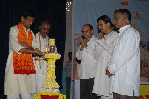 Bramha Sri Kuntaru Sri Ravish Tantri lighting the deep