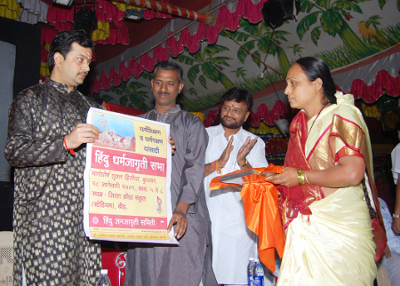 Rashtra Sant H.H. Bhayyu Maharaj releasing poster for Dahrmasabha