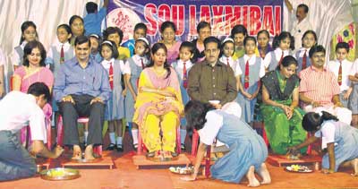 Students rehearse for the Valentine's Day celebrations on Friday