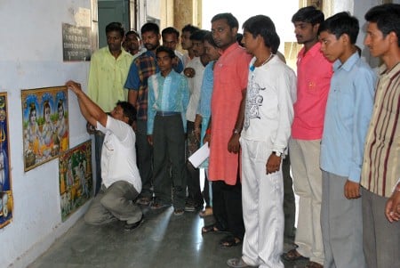 Devout Hindus removing Deities' pictures from walls