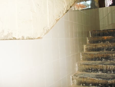 Tiles with Deities' pictures removed from walls of building of Bank