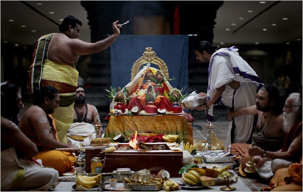 Hindu Priests performing ritual for Reconsecration