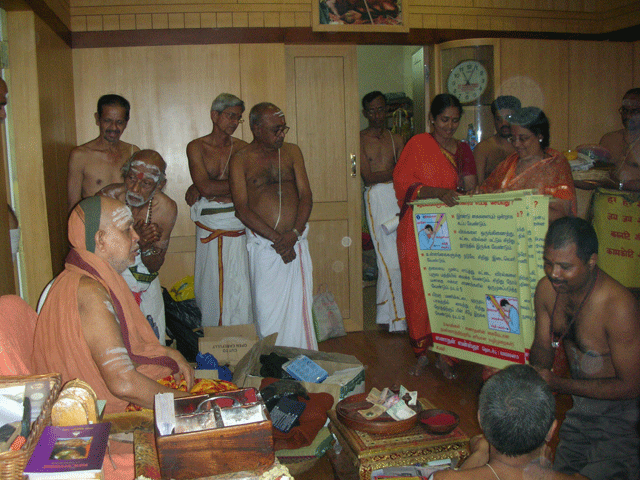 H.H. Kanchi Shankaracharya reading the flex about the Temple