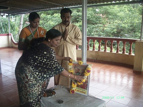 Mr. Nita Kandolkar inaugurating the program by lighting an Auspicious Lamp