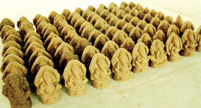 Small Ganesh Idols made from clay  for free distribution
