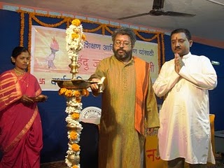 Lighting the holy lamp Dr. Shevade and Dr. Uday Dhuri