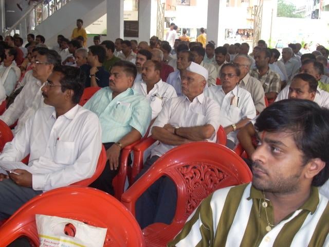 Devout Hindus and Temple trustees present for the program