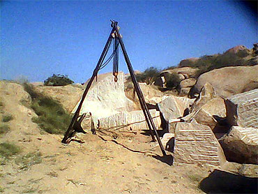 Contractors are digging up the area around the temple