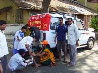 HJS members aiding injured citizens through the Ambulance