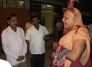 Left : Mr. Vinay Bhalke and Mr. Rahul Kolhapure while giving information to Jagadguru Shankaracharya