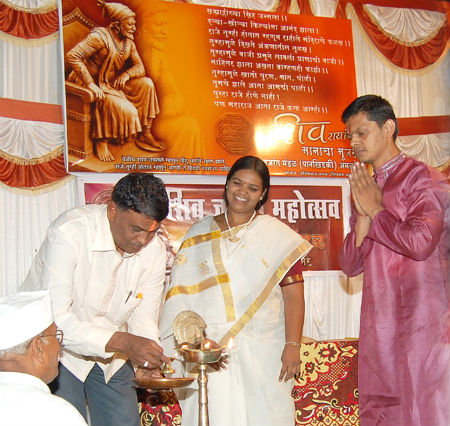 Inauguration of the program by the dignitaries by lighting a Samai Inauguration of the program by the dignitaries by lighting a Samai