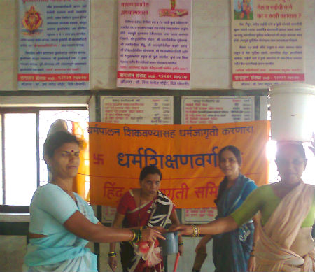 Women from the village cleaning the temple