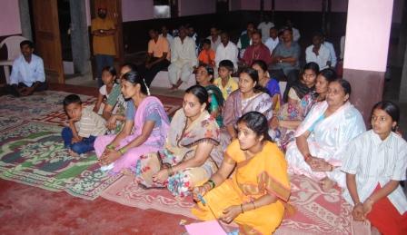 Devout Hindus present for the lecture