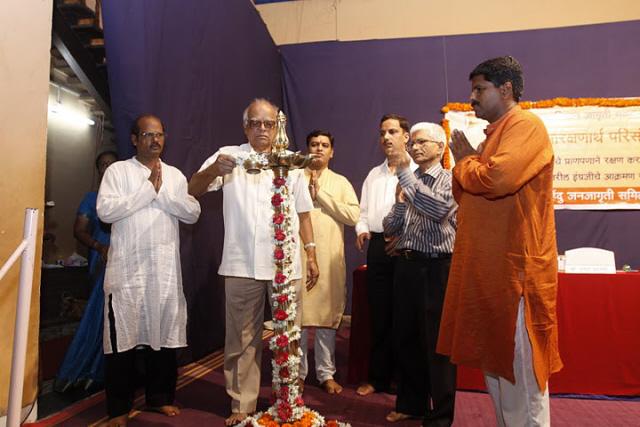 Inauguration of the symposium by lighting a Samai (an oil lamp)