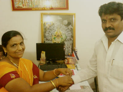 n: Kalyan : Mrs. Seema Bhor of HJS tying rakhi on the hand of Mr. Prakash Bhoir, MLA of MNS n: Kalyan : Mrs. Seema Bhor of HJS tying rakhi on the hand of Mr. Prakash Bhoir, MLA of MNS