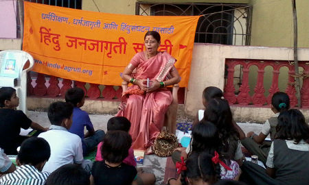 Mrs. Mandhare of HJS guiding to the children Mrs. Mandhare of HJS guiding to the children