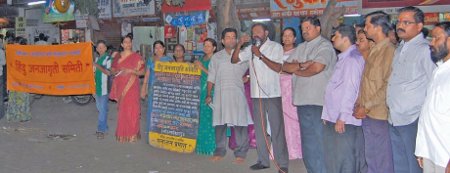 Devout Hindus addressing the assembly of people during the demonstration.