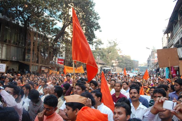 Hindus listening to the speech by dignitaries on the dias