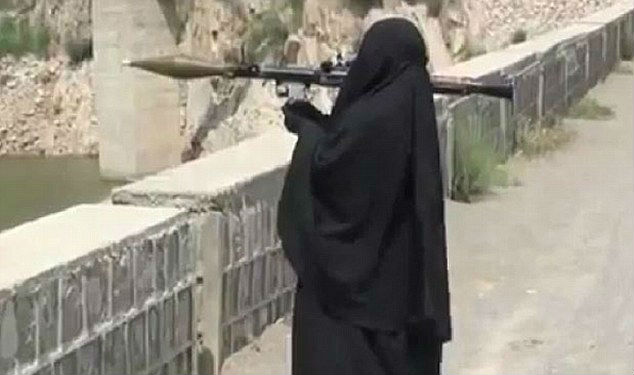 Hidden attack: A woman wields a deadly rocket-propelled-grenade Hidden attack: A woman wields a deadly rocket-propelled-grenade